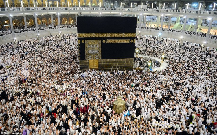 Hajj pilgrims circumambulate the Ka'bah.