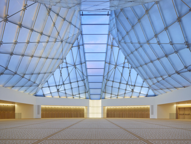 The interior of the prayer hall of the Toronto Ismaili Centre, with the Mihrab and the Qiblah Wall at the front.